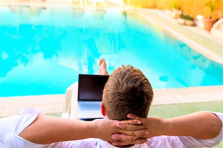 simsearch:400-08111295,k - carefree male relaxes on a sun lounger Stock Photo - Budget Royalty-Free & Subscription, Code: 400-08037391