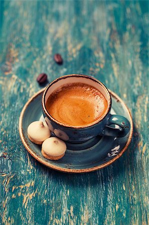 cup of coffee with cookies on a blue table Fotografie stock - Microstock e Abbonamento, Codice: 400-08037766