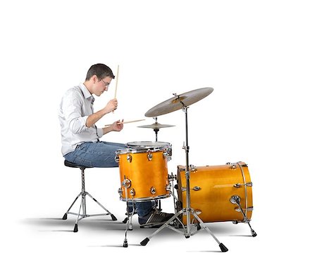 A musician plays his drums with passion Stock Photo - Budget Royalty-Free & Subscription, Code: 400-08038198
