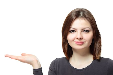 simsearch:400-08038938,k - Portrait of a young lady presenting something on her hand on white background Stockbilder - Microstock & Abonnement, Bildnummer: 400-08038919