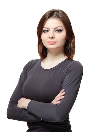 simsearch:400-08038938,k - Portrait of a young lady with crossed arms on white background Stockbilder - Microstock & Abonnement, Bildnummer: 400-08038922