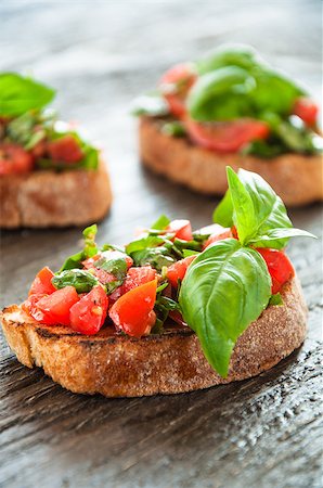 simsearch:824-02888261,k - Italian tomato bruschetta with chopped vegetables, herbs and oil on grilled or toasted crusty ciabatta bread Stock Photo - Budget Royalty-Free & Subscription, Code: 400-08031814