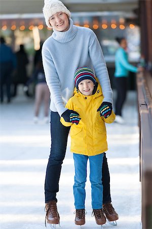 simsearch:400-08318057,k - young mother and her son ice skating together at outdoor skating rink at winter Stock Photo - Budget Royalty-Free & Subscription, Code: 400-08032387