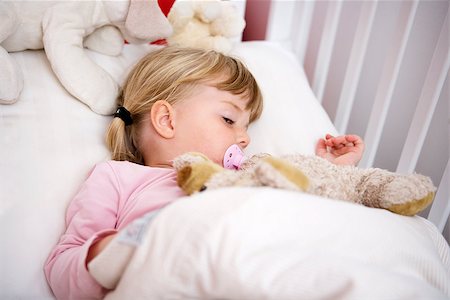 Baby Girl in her bed Stock Photo - Budget Royalty-Free & Subscription, Code: 400-08032416