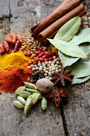 simsearch:400-06069438,k - Herbs and spices selection, on wooden table background Photographie de stock - Aubaine LD & Abonnement, Code: 400-08032503