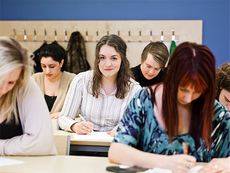 Large group of young adults studying in a classroom Stock Photo - Budget Royalty-Free & Subscription, Code: 400-08032688