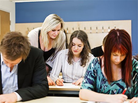 Large group of young adults studying in a classroom Stock Photo - Budget Royalty-Free & Subscription, Code: 400-08032689