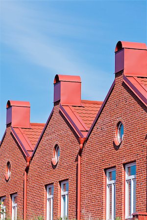 row of houses usa - Brick Wall building towards blue sky Stock Photo - Budget Royalty-Free & Subscription, Code: 400-08032716