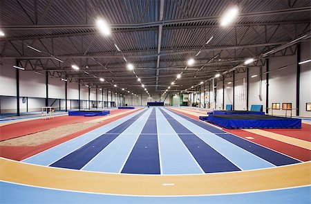 relay race competitions - Interior of an athletic arena Foto de stock - Super Valor sin royalties y Suscripción, Código: 400-08032988