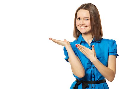 Young woman points to a product on white Fotografie stock - Microstock e Abbonamento, Codice: 400-08033135