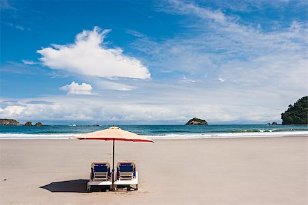 simsearch:862-06542597,k - Two chairs and umbrella at the beach. Manuel Antonio, Costa Rica. Foto de stock - Super Valor sin royalties y Suscripción, Código: 400-08033276