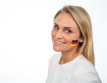 face painting for football - Young Girl with the German flag painted on her cheek Stock Photo - Budget Royalty-Free & Subscription, Code: 400-08033534
