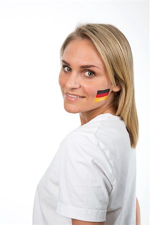 face painting for football - Young Girl with the German flag painted on her cheek Stock Photo - Budget Royalty-Free & Subscription, Code: 400-08033537