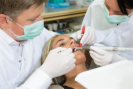 simsearch:400-04016093,k - Young woman at the Dentist Photographie de stock - Aubaine LD & Abonnement, Code: 400-08033645