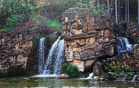 Waterfall and blue stream in the forest Photographie de stock - Aubaine LD & Abonnement, Code: 400-08033837