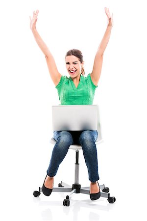 Beautiful and happy female student sitting on a chair with a laptop and arms up, isolated over a white background Stock Photo - Budget Royalty-Free & Subscription, Code: 400-08033887