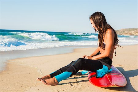 simsearch:400-07431120,k - Beautiful surfist sitting over her surfboard Stock Photo - Budget Royalty-Free & Subscription, Code: 400-08033929