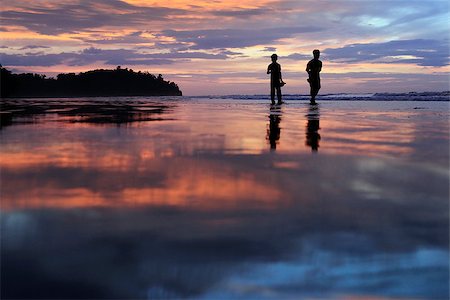 family relaxing with kids in the sun - Coast of the South China Sea on sunset. Borneo Photographie de stock - Aubaine LD & Abonnement, Code: 400-08033972