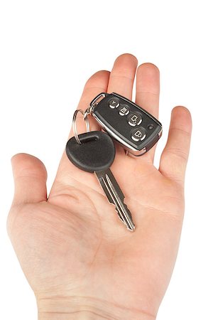 simsearch:400-04590086,k - car key with alarm in hand isolated Photographie de stock - Aubaine LD & Abonnement, Code: 400-08044344