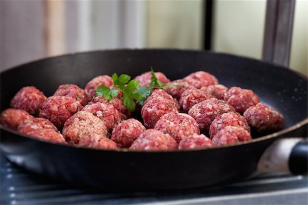 Raw meat balls in the pan. Beef meat balls Stock Photo - Budget Royalty-Free & Subscription, Code: 400-08045065