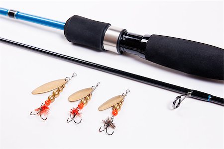 simsearch:400-07033947,k - Fishing rod with fishing lures isolated on white. Foto de stock - Super Valor sin royalties y Suscripción, Código: 400-08045098