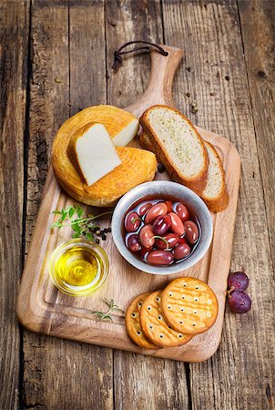 simsearch:400-07481826,k - Greek olives, cheese and extra virgin Olive oil  on a wooden board Stock Photo - Budget Royalty-Free & Subscription, Code: 400-08046876