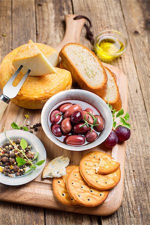 simsearch:400-07481826,k - Greek olives and cheese on a wooden board Stock Photo - Budget Royalty-Free & Subscription, Code: 400-08046877