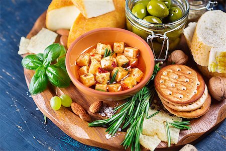 simsearch:400-07481826,k - Cheese with olives and green herbs, party snack appetiser Stock Photo - Budget Royalty-Free & Subscription, Code: 400-08047350