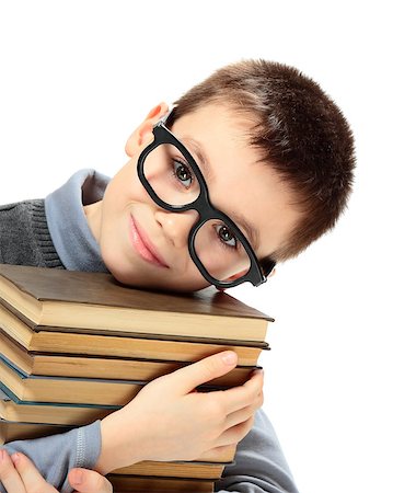 paleka (artist) - Young boy with glasses and books  isolated on white background Foto de stock - Super Valor sin royalties y Suscripción, Código: 400-08048333