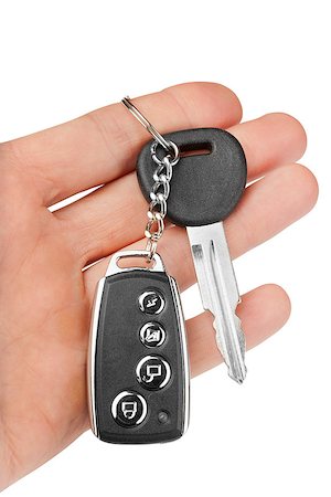 simsearch:400-04590086,k - car key with alarm in hand isolated Photographie de stock - Aubaine LD & Abonnement, Code: 400-08040071