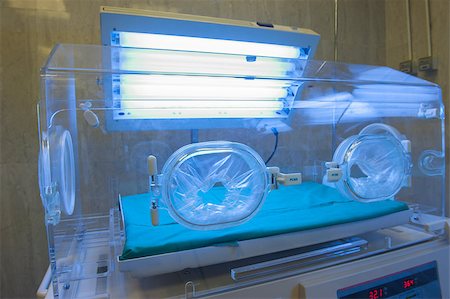 Closeup of an infant incubator technology in a medical center hospital Stock Photo - Budget Royalty-Free & Subscription, Code: 400-08040323