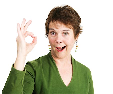 rheumatoid arthritis - Pretty, mature woman with a pixie cut smiles and gives the Okay hand sign.  Isolated on white. Stock Photo - Budget Royalty-Free & Subscription, Code: 400-08040667