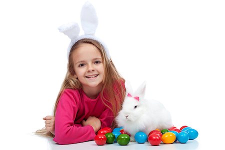 simsearch:400-08036284,k - Happy girl with her easter rabbit and colorful dyed eggs - isolated Stockbilder - Microstock & Abonnement, Bildnummer: 400-08043112