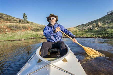 simsearch:400-07176700,k - senior paddler in a decked expedition canoe on Horsetooth Reservoir, Fort Collins, Colorado, springtime scenery Foto de stock - Super Valor sin royalties y Suscripción, Código: 400-08054297