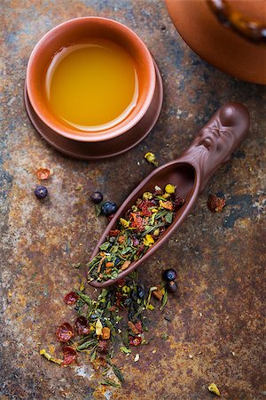 dry fruits crops - Cup with tea and green tea in scoop. Asian tea Stock Photo - Budget Royalty-Free & Subscription, Code: 400-08054329