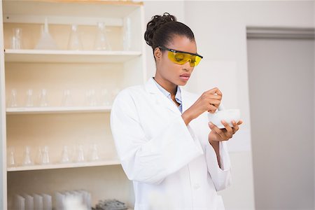 simsearch:400-08055396,k - Concentrated scientist using pestle and mortar in laboratory Stock Photo - Budget Royalty-Free & Subscription, Code: 400-08055368