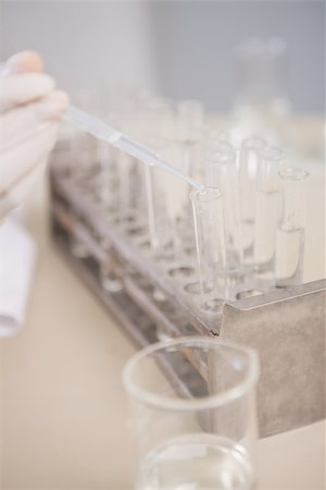 simsearch:400-08055396,k - Scientist analyzing test tube in laboratory Stock Photo - Budget Royalty-Free & Subscription, Code: 400-08055379