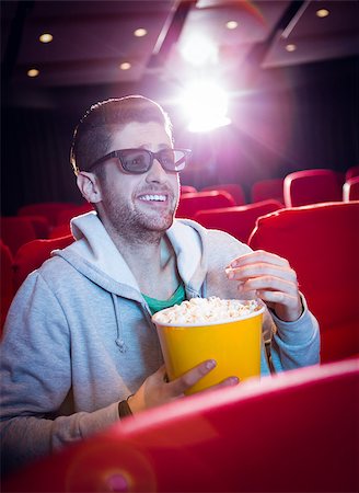 simsearch:400-08055721,k - Young man watching a 3d film at the cinema Foto de stock - Royalty-Free Super Valor e Assinatura, Número: 400-08055710