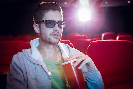 simsearch:400-08055721,k - Young man watching a 3d film at the cinema Foto de stock - Royalty-Free Super Valor e Assinatura, Número: 400-08055711