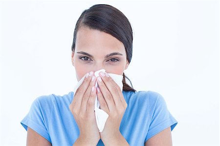 simsearch:400-06888942,k - Sick woman blowing her nose on white background Photographie de stock - Aubaine LD & Abonnement, Code: 400-08056000