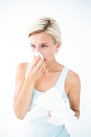 photo of a woman crying and blowing her nose - on white background Stock Photo - Budget Royalty-Free & Subscription, Code: 400-08056155