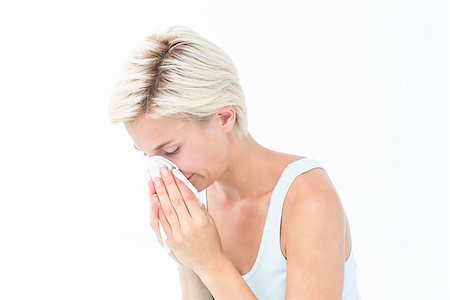 simsearch:400-06888942,k - Sick woman blowing her nose on white background Photographie de stock - Aubaine LD & Abonnement, Code: 400-08056153