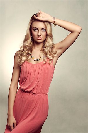 simsearch:400-04058311,k - vintage version of summer blond young woman , with color dress , and jewellery. She is posing on grunge background Foto de stock - Super Valor sin royalties y Suscripción, Código: 400-08052510