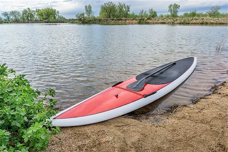 simsearch:400-07795226,k - red stand up paddleboard on a lake shore in Colorado,. early spring Foto de stock - Royalty-Free Super Valor e Assinatura, Número: 400-08053221