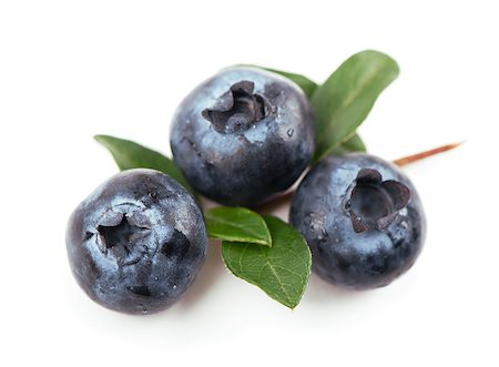 Group of blueberries. Isolated on the white Fotografie stock - Microstock e Abbonamento, Codice: 400-08074048