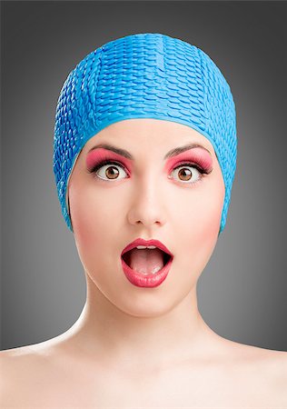 Portrait of a beautiful woman wearing a swim cap Stock Photo - Budget Royalty-Free & Subscription, Code: 400-08074080
