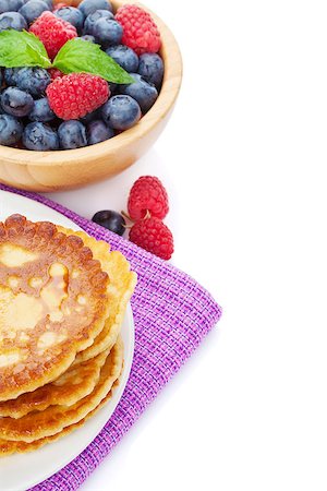 simsearch:400-09019412,k - Pancakes with raspberry, blueberry, mint and honey syrup. Isolated on white background Foto de stock - Super Valor sin royalties y Suscripción, Código: 400-08074269