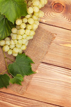 simsearch:400-08110621,k - Bunch of white grapes on wooden table background with copy space Stock Photo - Budget Royalty-Free & Subscription, Code: 400-08074279