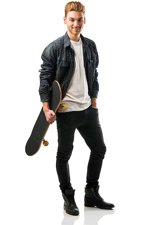 swag - Studio portrait of a young man posing with a skateboard Stock Photo - Budget Royalty-Free & Subscription, Code: 400-08074621