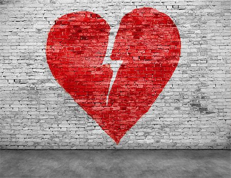 Shape of broken heart painted on brick wall Stock Photo - Budget Royalty-Free & Subscription, Code: 400-08074726